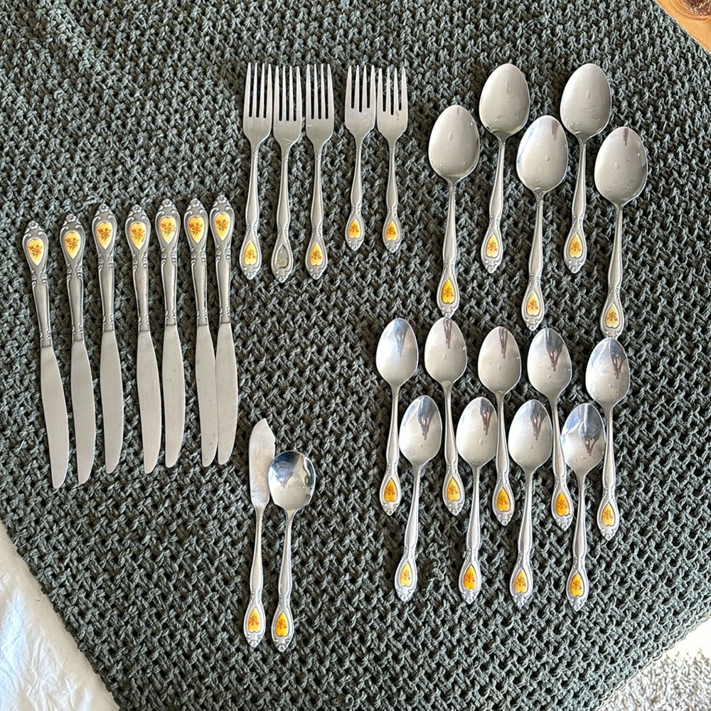 28 pc Silverware with floral insert stainless custom craft